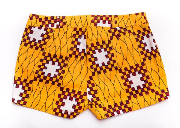TAYE-Afrykańskie-wzory-afrykański-wosk-ołówkowa-spodnica-moda-damskie-w-polsce-szorty-żółte-back